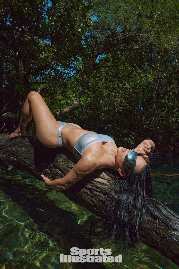 Kim Kardashian was photographed by Greg Swales in the Dominican Republic. Swimsuit by SKIMS. Sunglasses by Balenciaga.